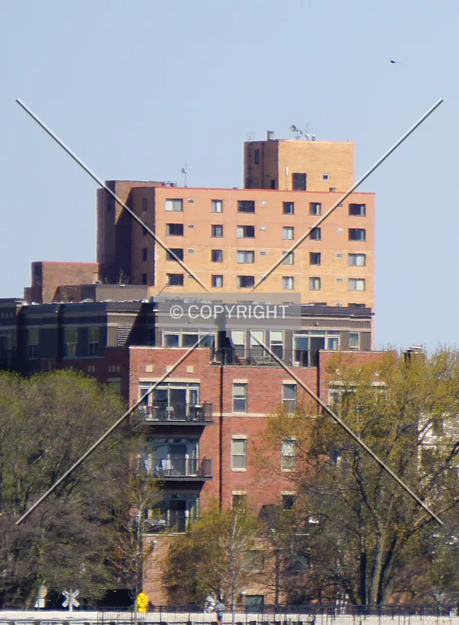 Distant view of the upper floors from the south; May 9, 2020
