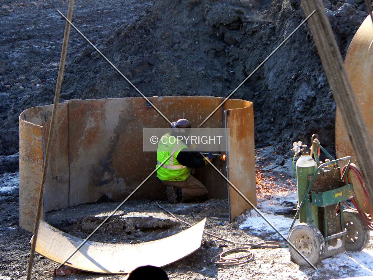 Worker using a torch