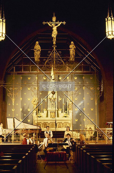 View towards the altar with an early music group performing