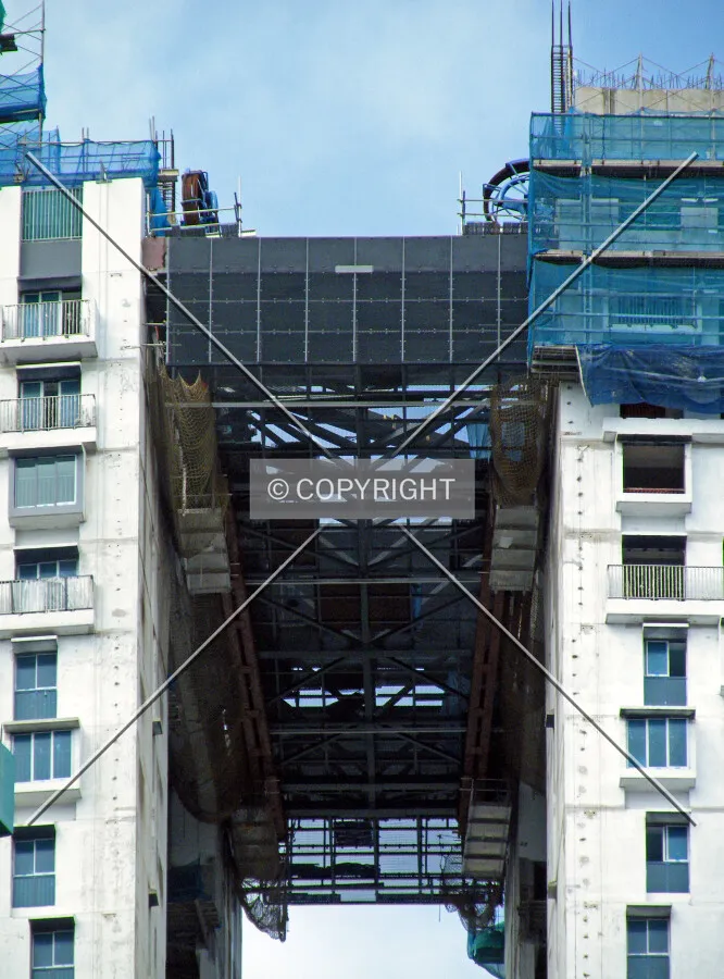 The sky bridge between Block 1F and Block 1G on the left