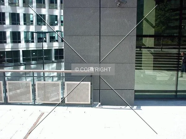 Facade detail at base of the tower nearby main entrance