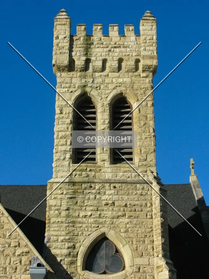 Crenellated tower from across 9th Street South