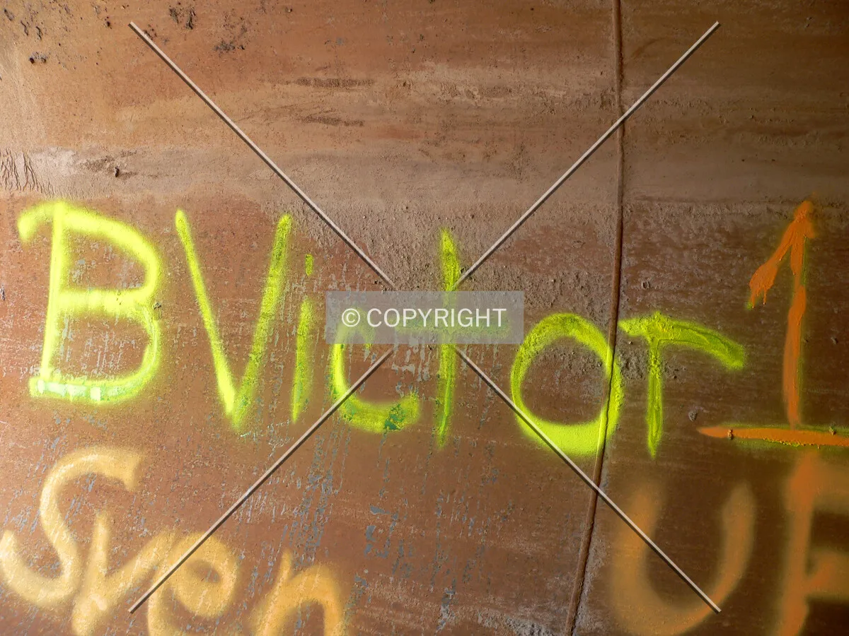 Signatures spray painted inside of the caisson rock can