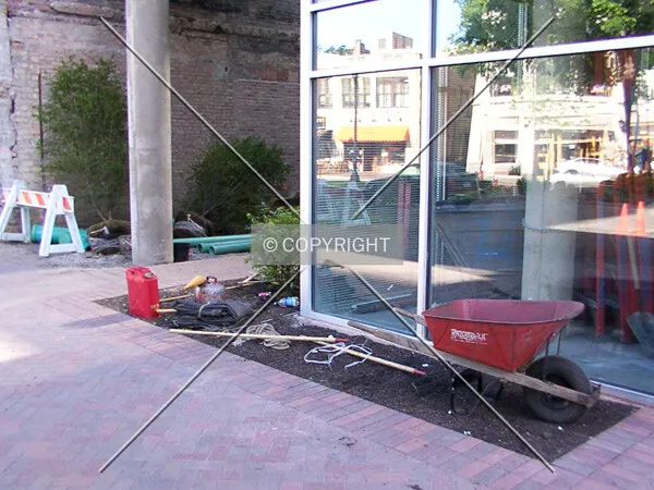 Landscaping equipment near courtyard