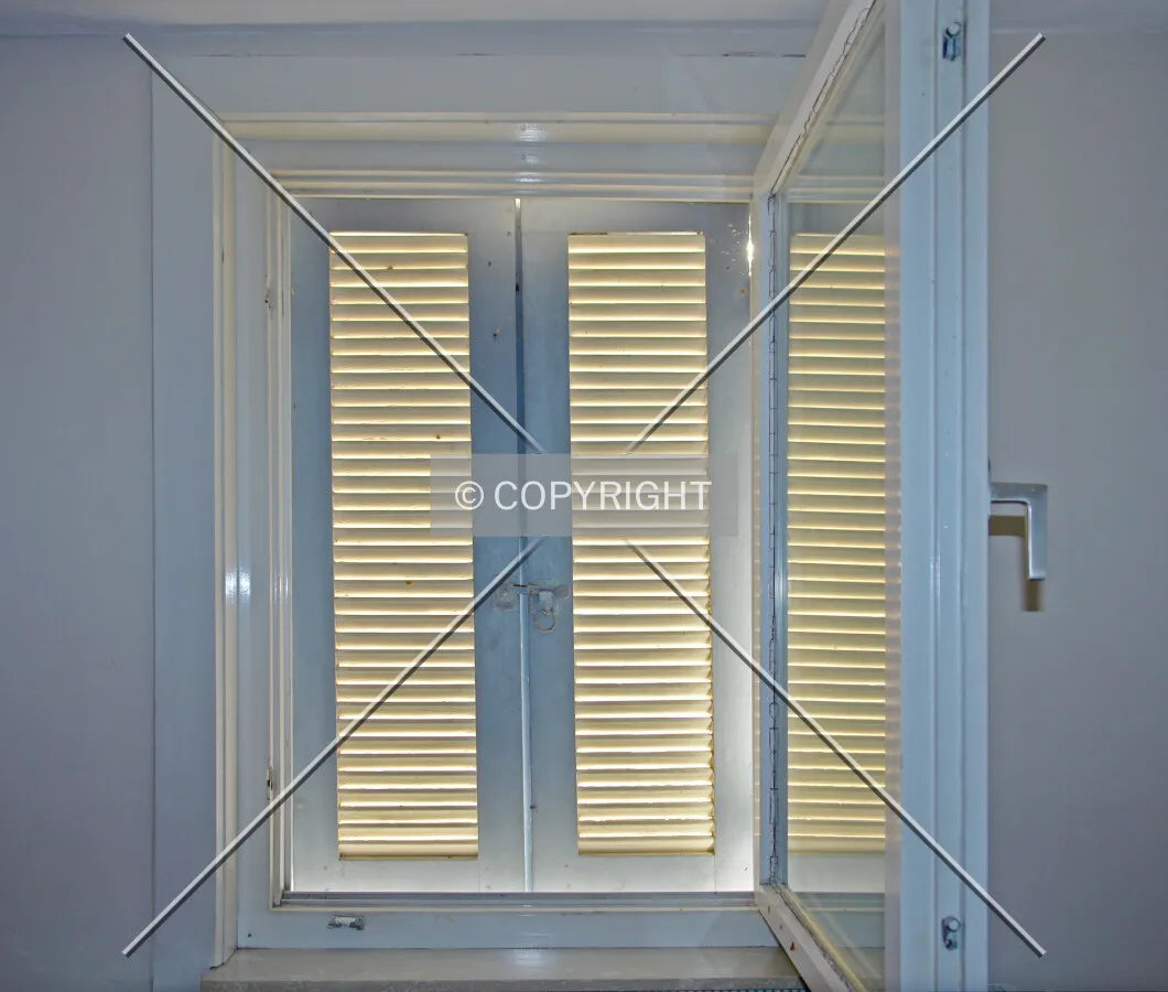 Closed window blinds; as seen from inside
