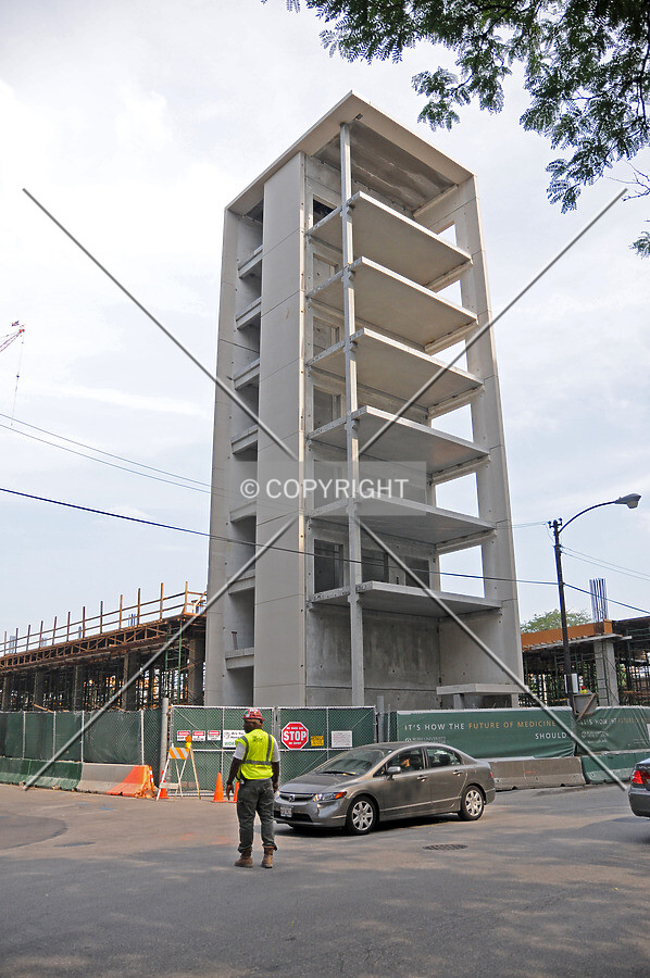 Pre-cast concrete elevator and stair tower for the new attached parking structure