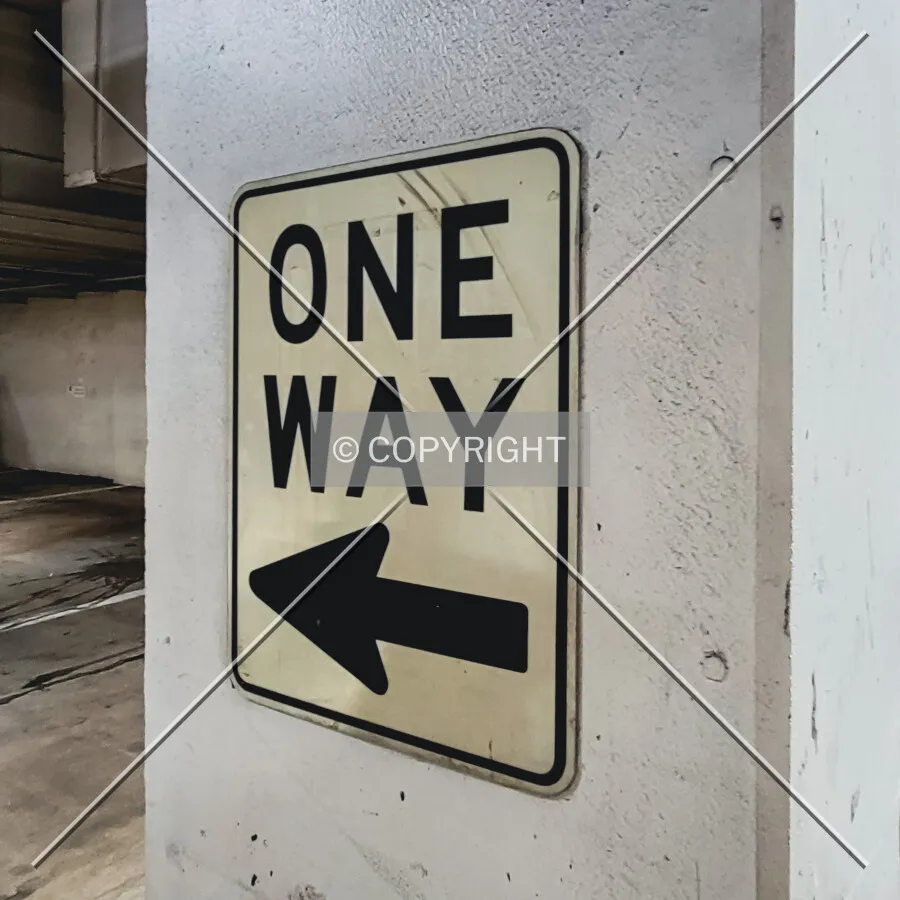 One way sign in the parking garage; July 4, 2021