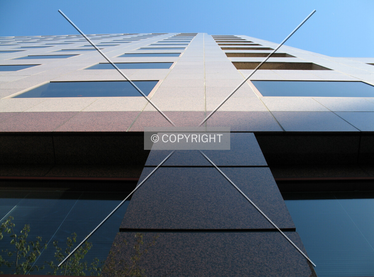 Pink and burgundy granite make up the lower and upper facades