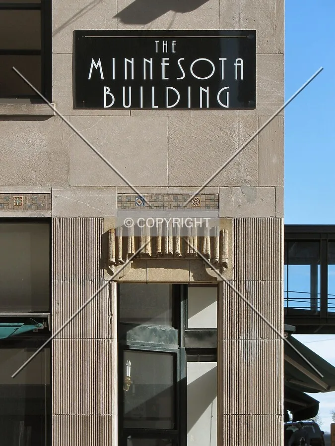 Building sign along East 4th Street