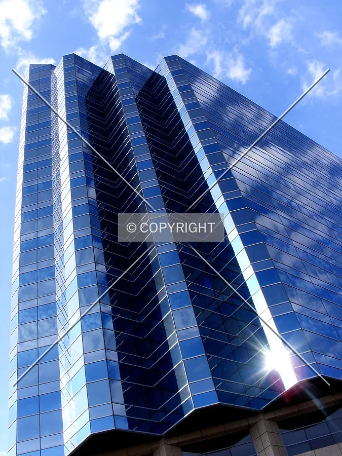 Looking up at facades three shades of blue