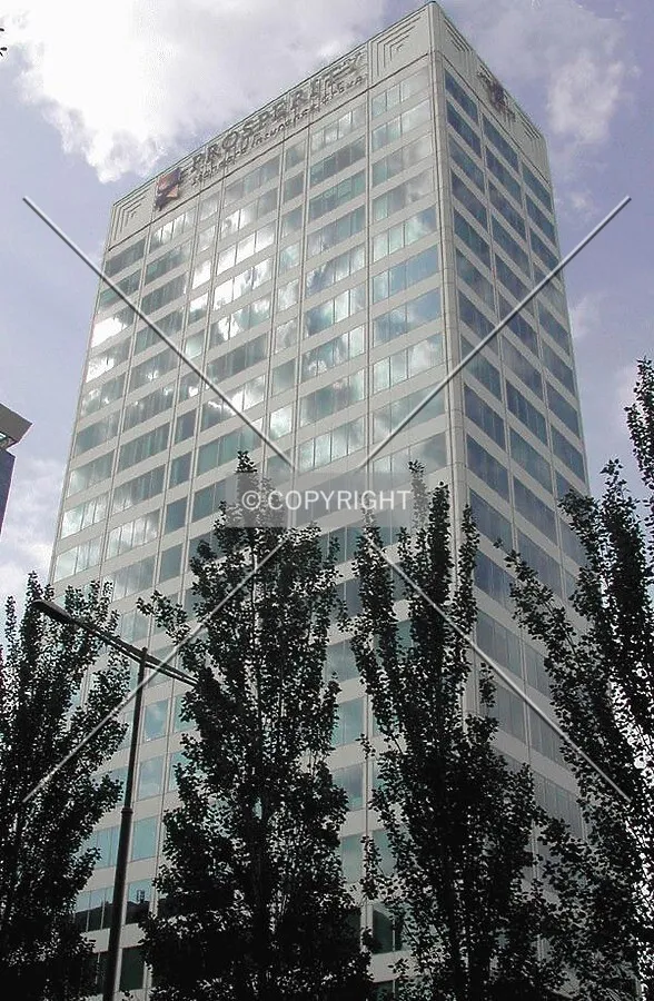 View of the sky reflected by the building's facade