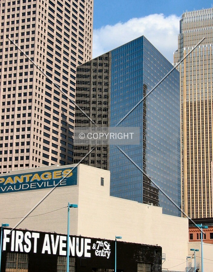Rising above the First Avenue Nightclub and Pantages Theater, from 1st Avenue/8th Street North