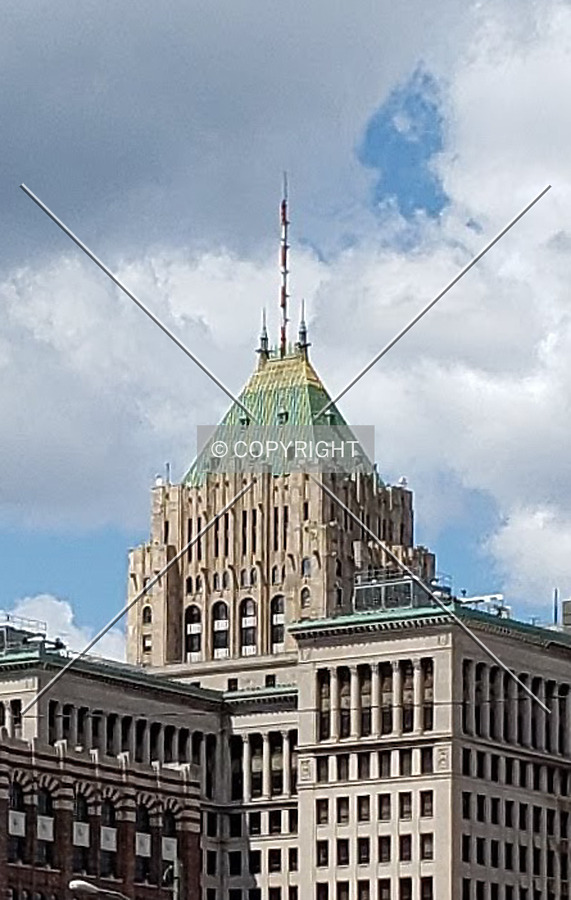 Distant southeast view of the upper floors; August 10, 2019