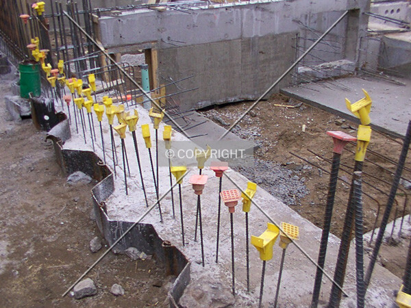 Retaining piles and foundation wall