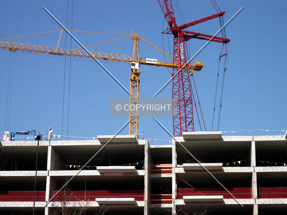 Looking over the current top floor with the Michigan Avenue Tower crane in the background
