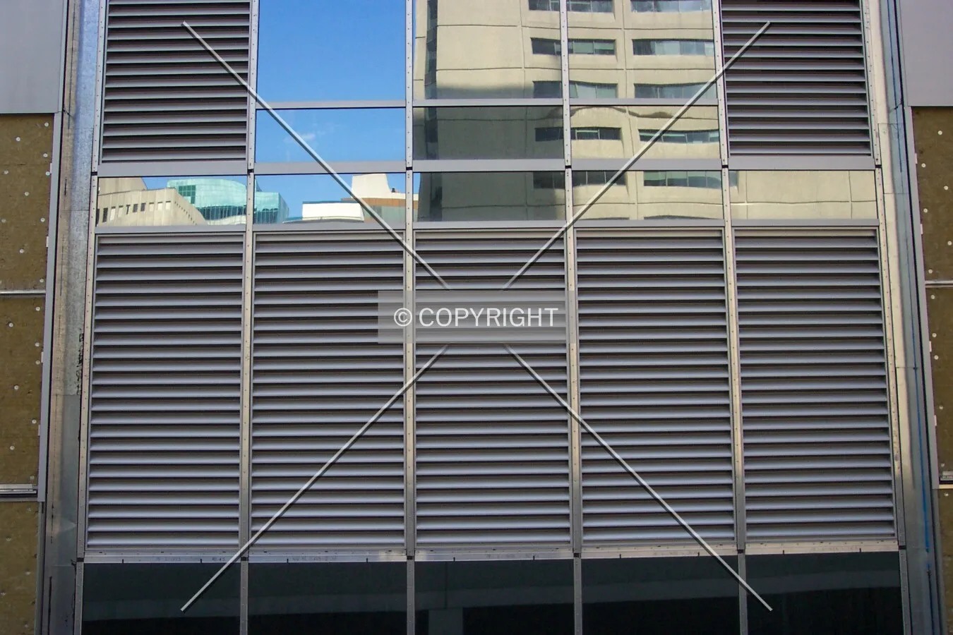 The ventilation grills on the east facade