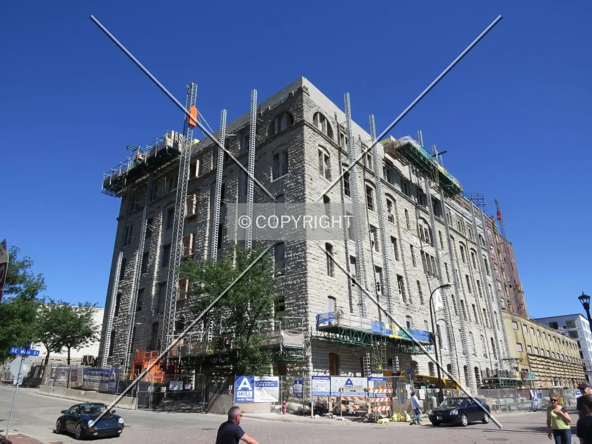 View to the northeast across 3rd Avenue and Main Street SE during renovation into lofts