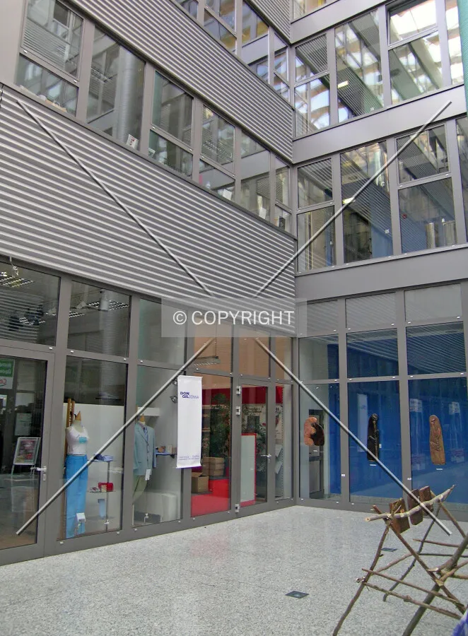 Inside of the building there are shops, caffee shop and many other shops