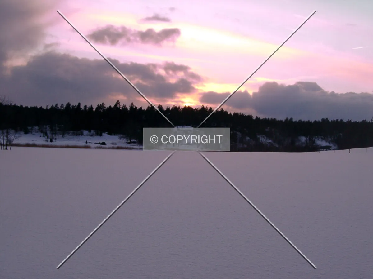 Sunset on a lake in winter