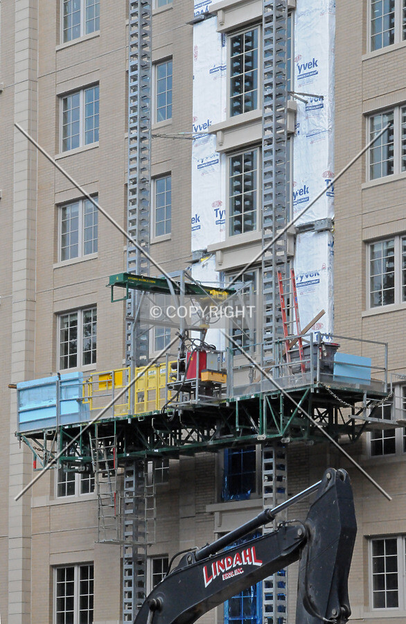 Masonry scaffold on an unfinished section of the western facade