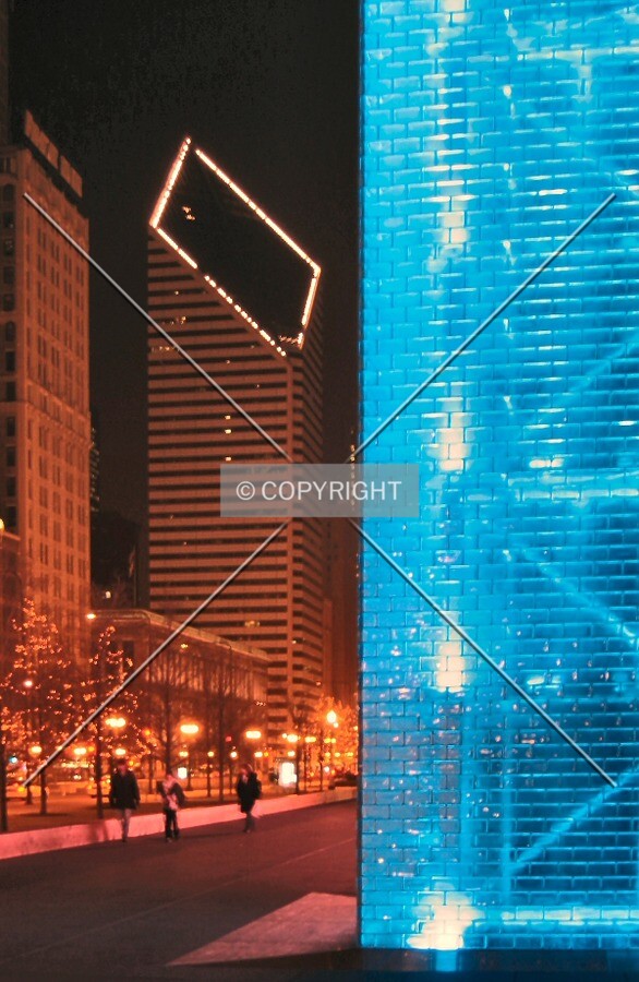 Rising beyond Millennium Park's Crown Fountain