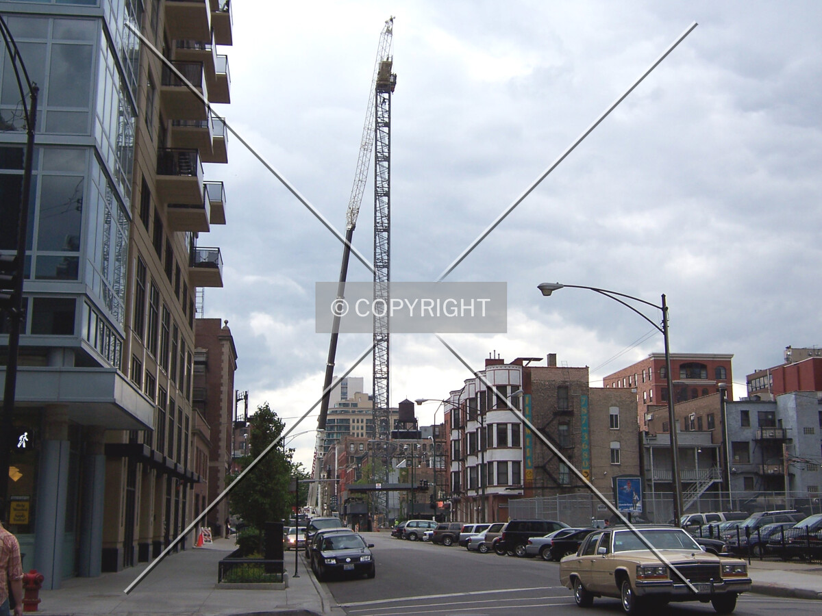 Looking west down Superior Street at the tower crane being erected