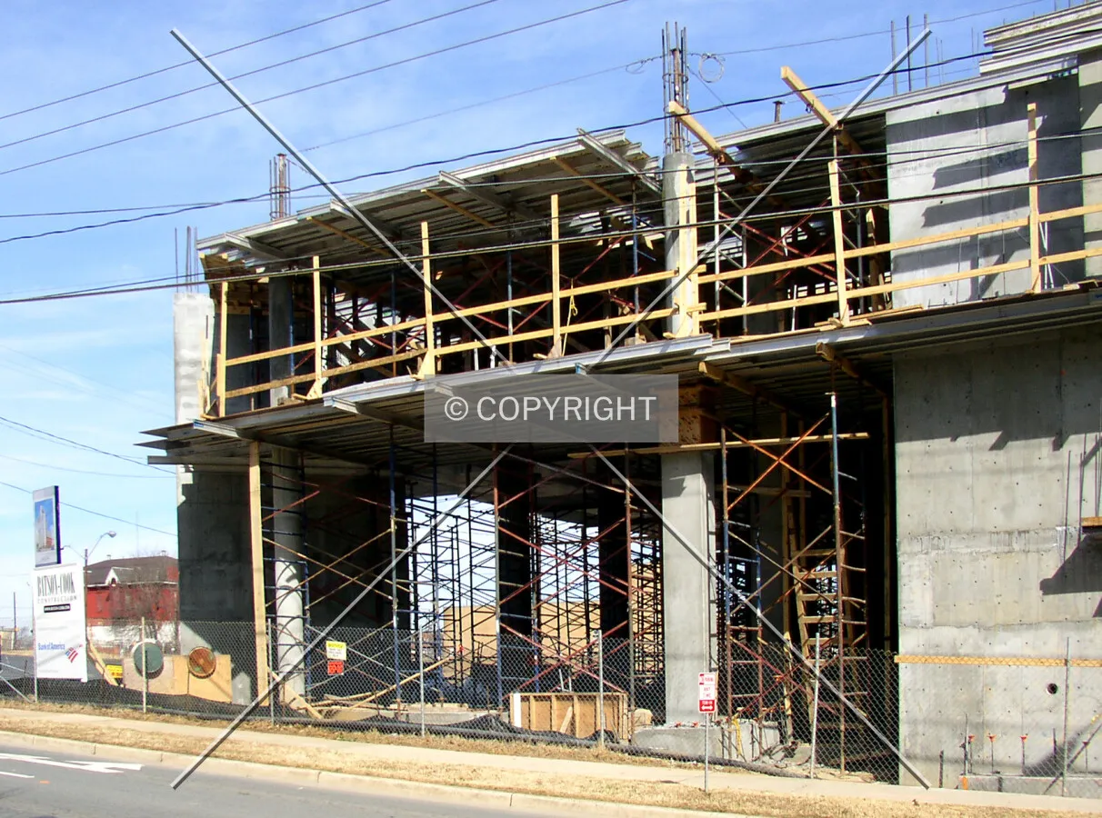Looking northwest from East 6th Street towards the southwest corner