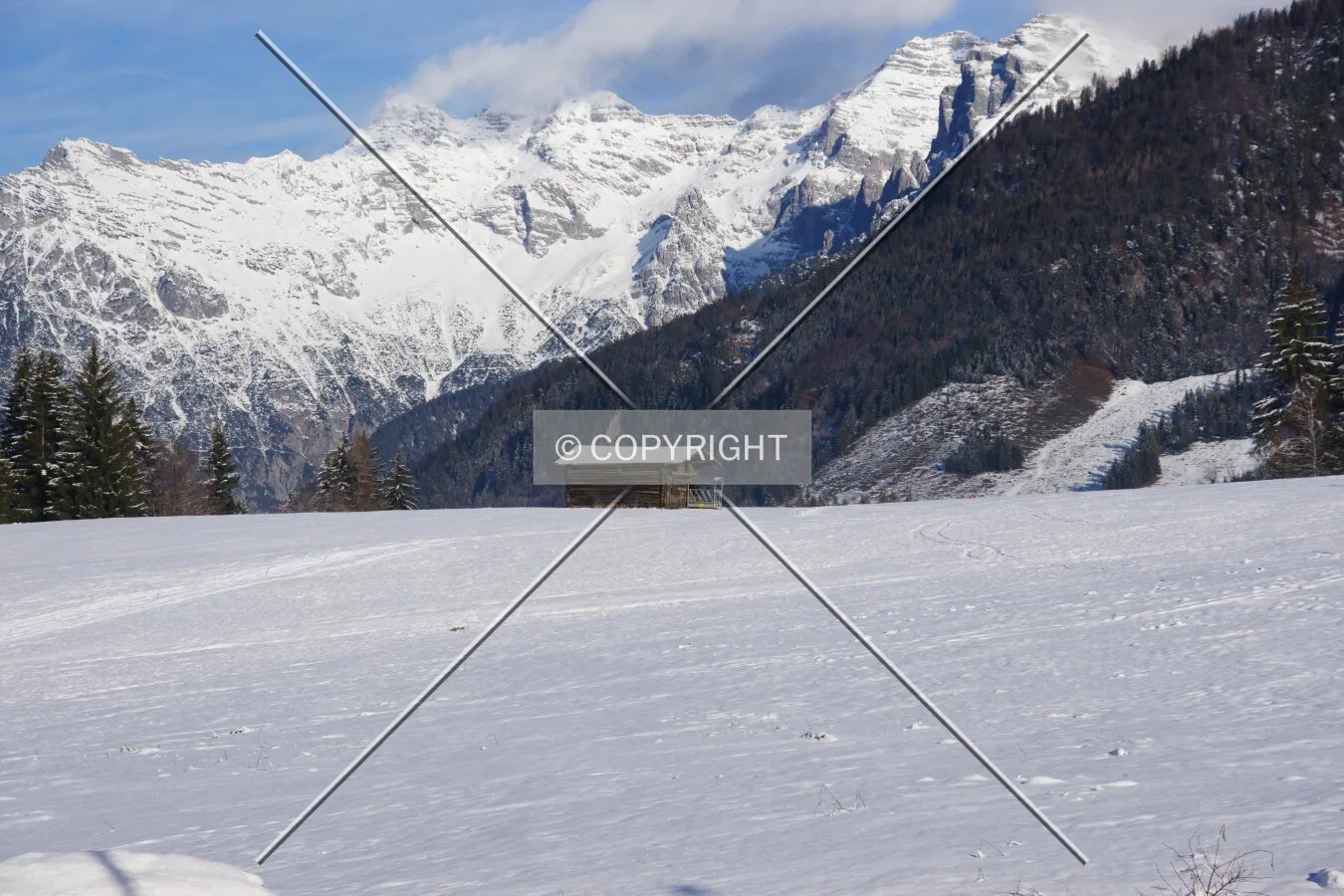 A snow-covered landscape in the austrian Alps