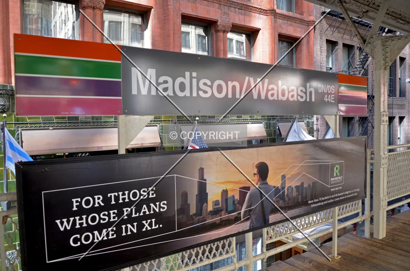 Station signage on the western platform; March 7, 2015.