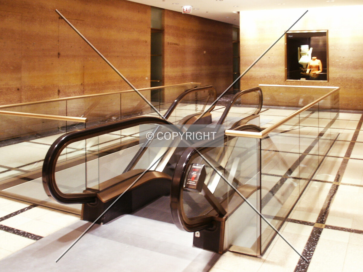 Escalators from the north office lobby to the lower concourse