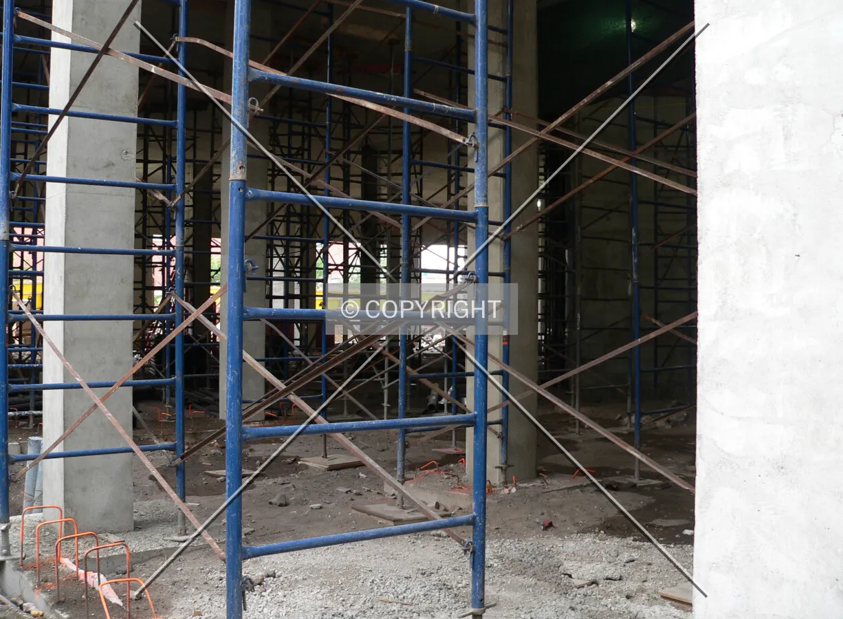 Looking through the structure with scaffolding supporting the floors above