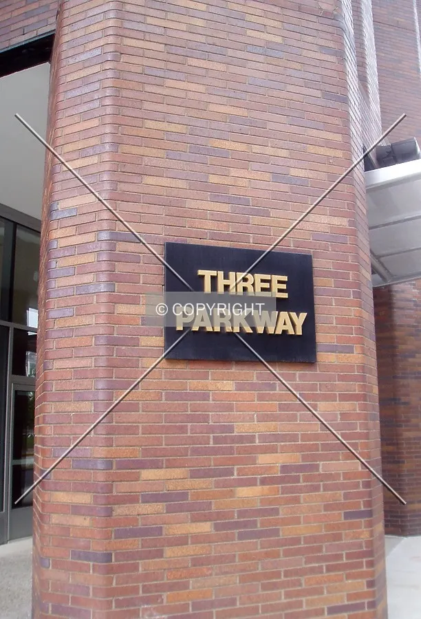 Building sign near the main entrance on the southwest corner