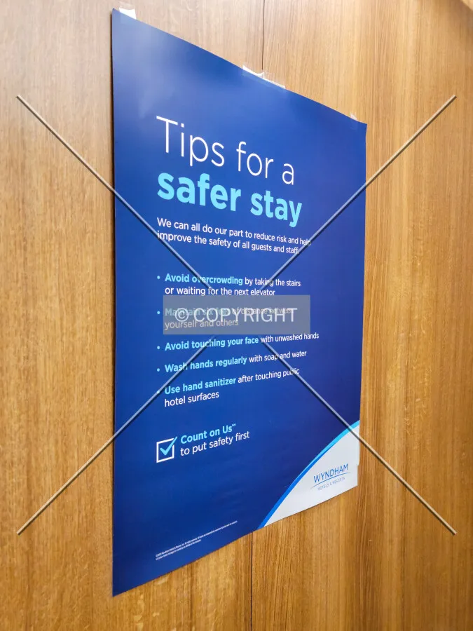 Safety sign inside the elevator; April 9, 2021