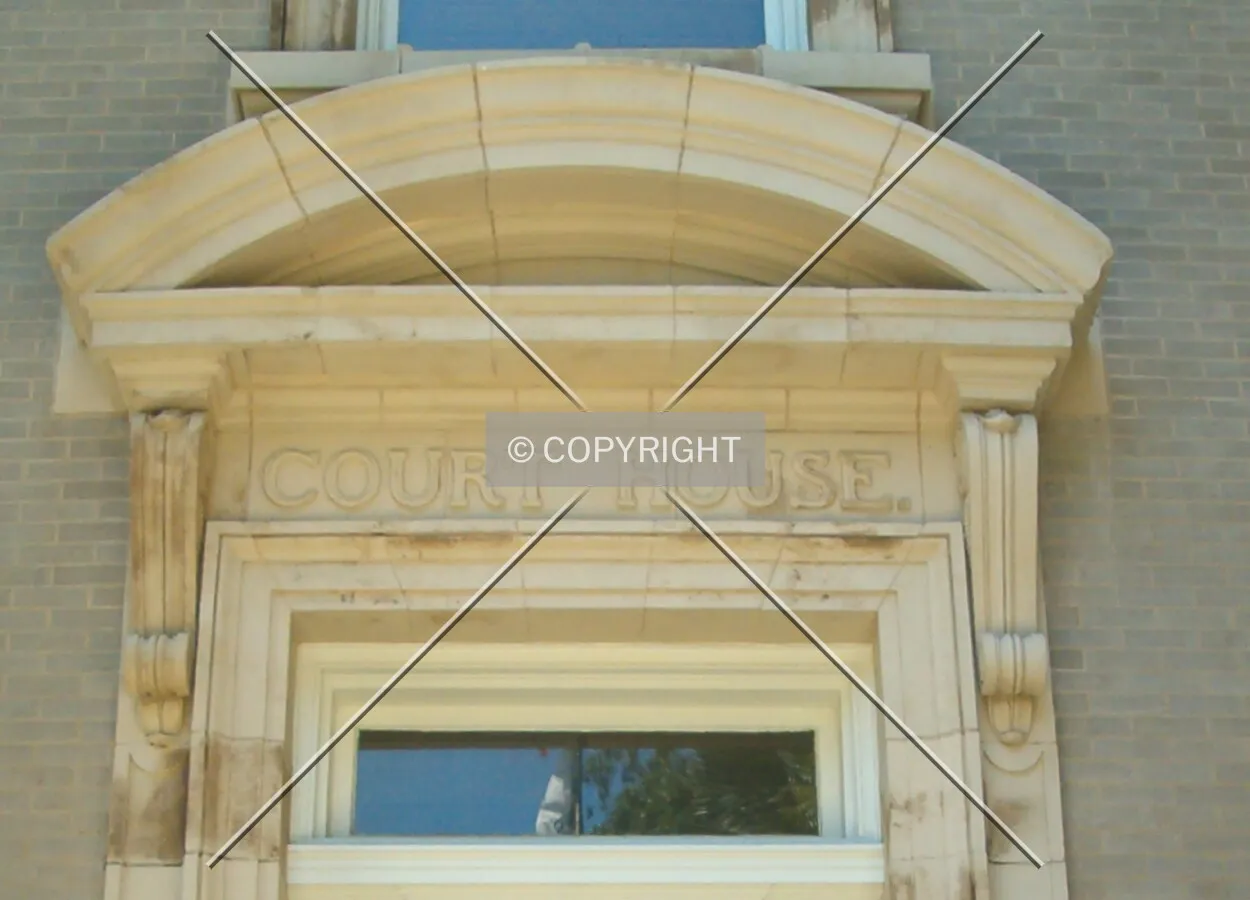 Granite sign above the door