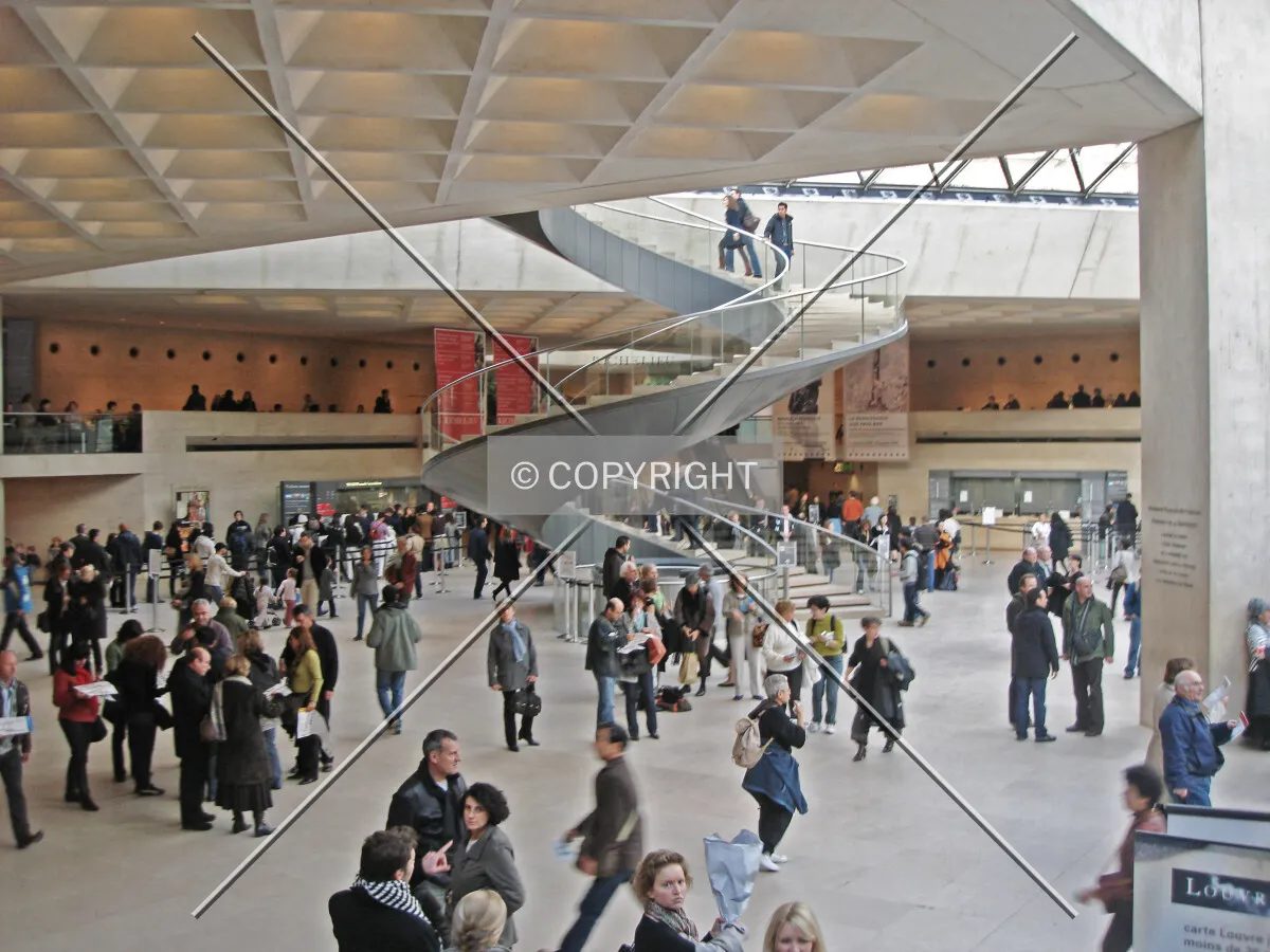 A view inside the main lobby of the Musée du Louvre in Paris