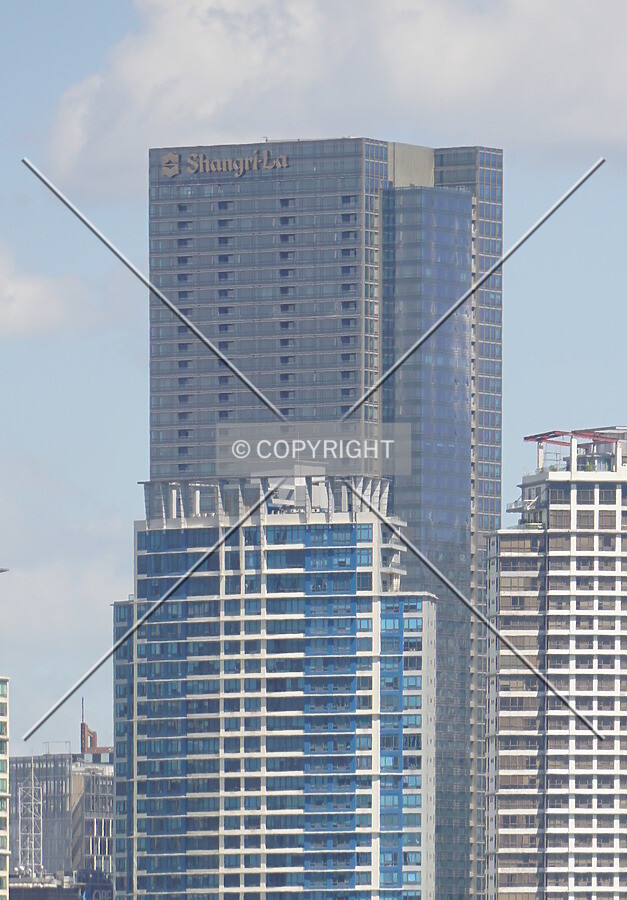 Distant view of the upper floors from the west; February 21, 2018