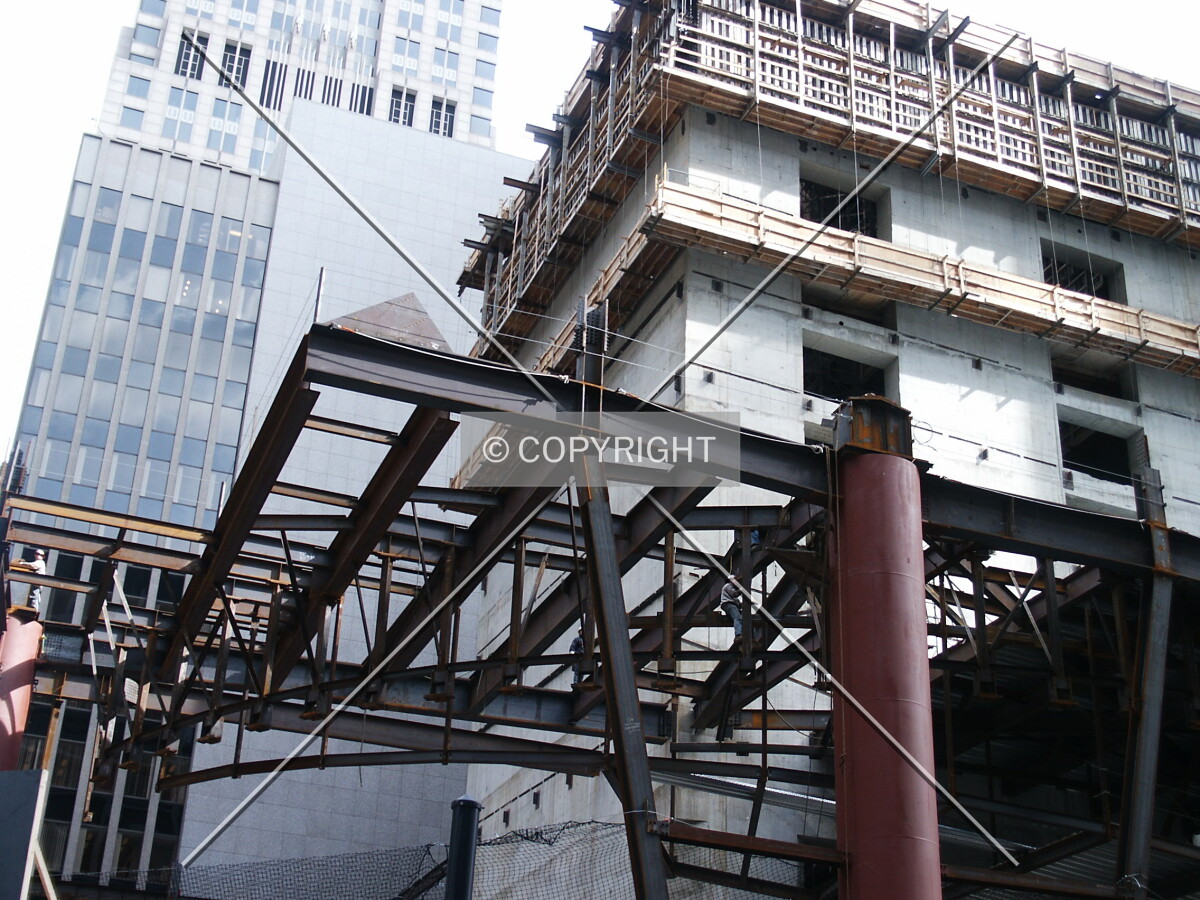 Steelworkers welding the frame