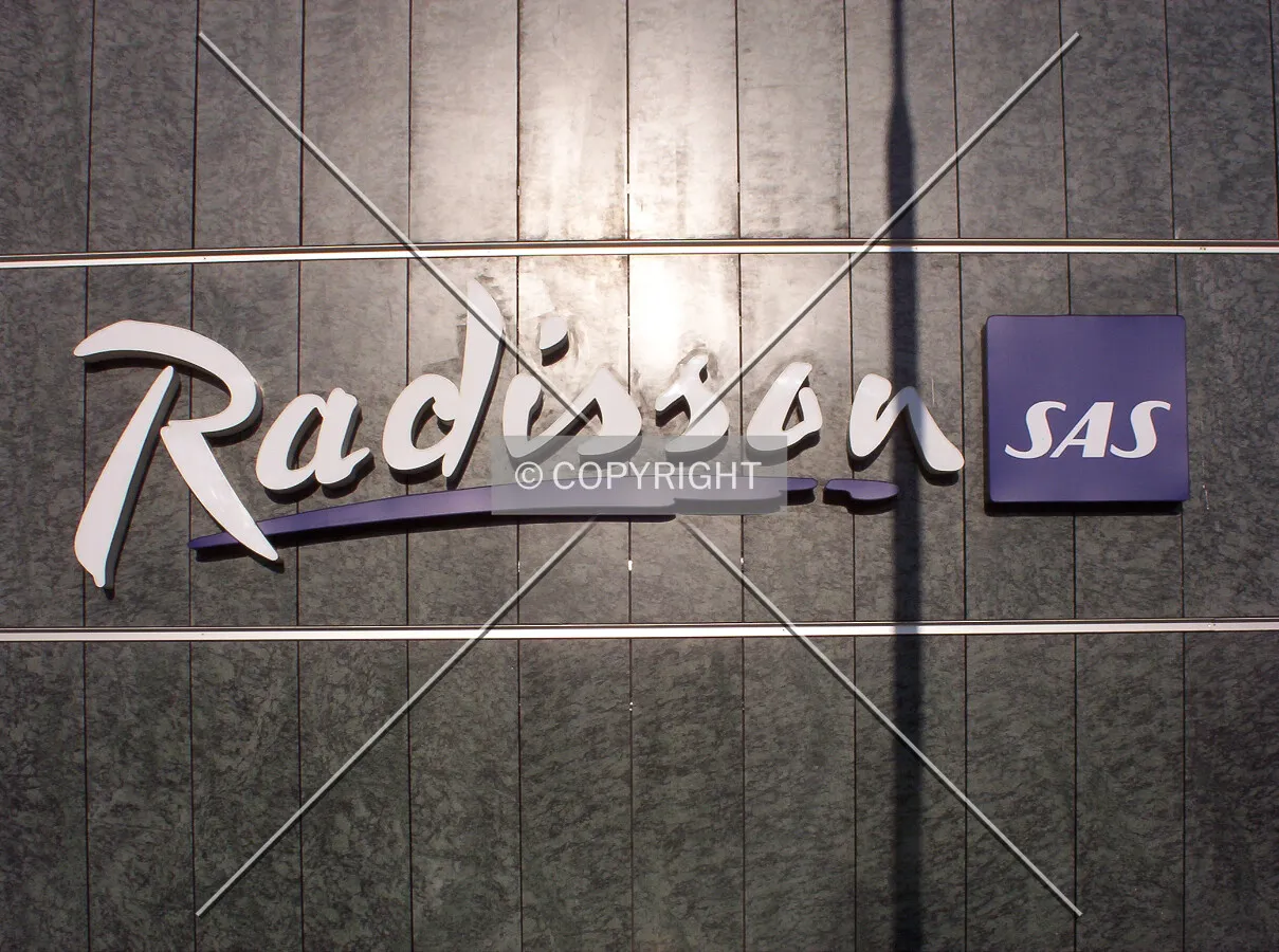 The hotel's logo near the entrance