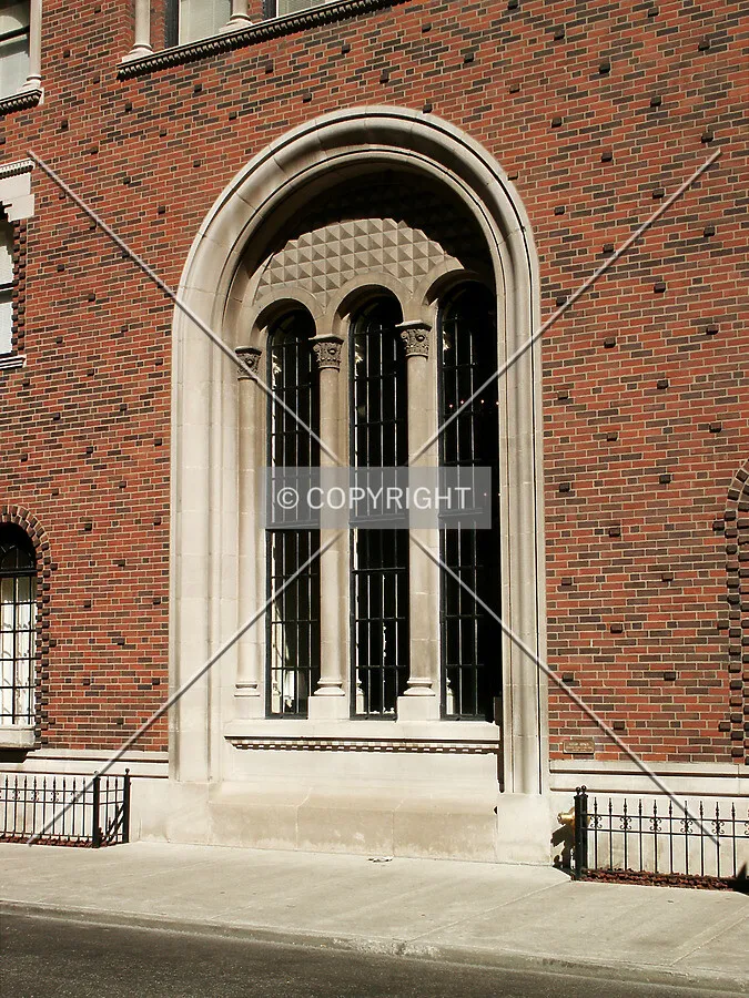 Arched windows at the west end of the lobby