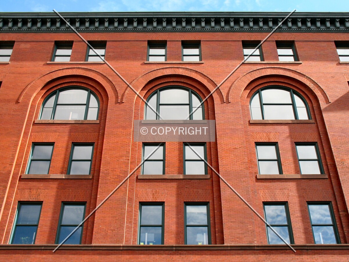 Above the main entrance, from East 5th Street