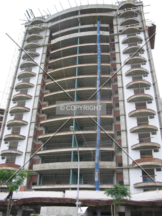 Placing the ceramic tiles in the facade