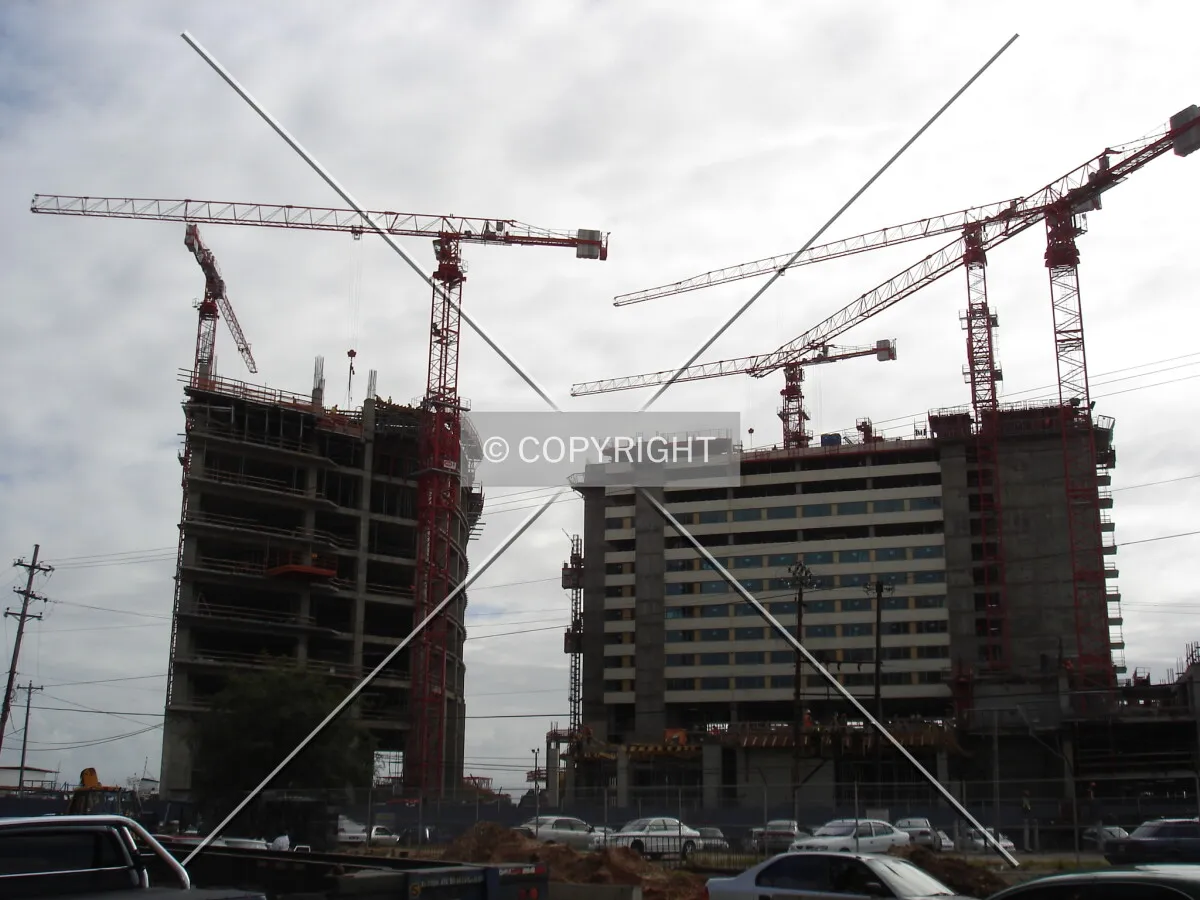 Under construction with Office Tower C at left, Hyatt at right