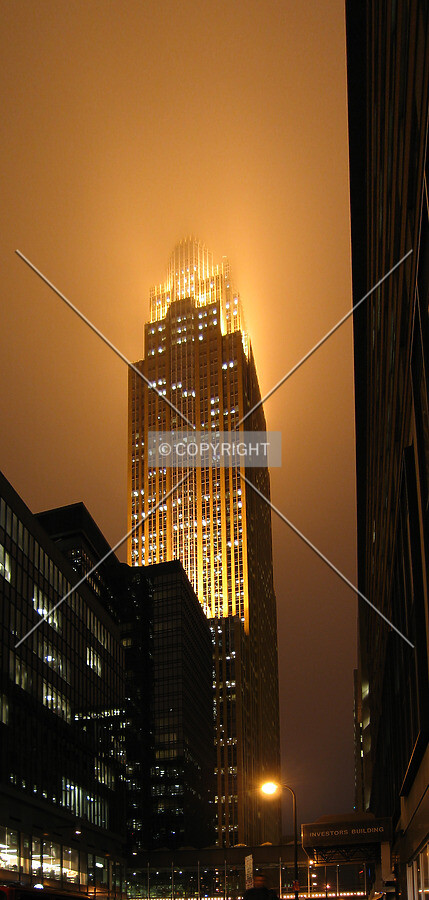 Glowing brightly on a foggy night