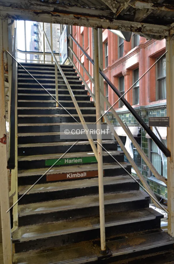 Western stairway to the transfer bridge between the eastern and western platforms; March 7, 2015.