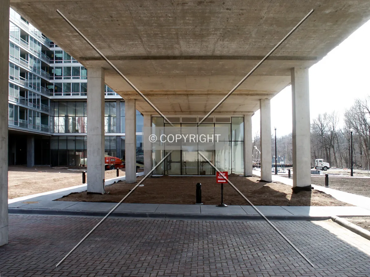Looking under the colonnade towards the west wing of Oak Tower