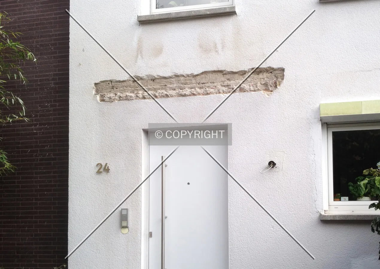 An entrance canopy was removed