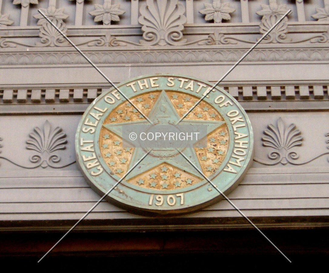 Great Seal of the State of Oklahoma hanging above the main entrance on the south side