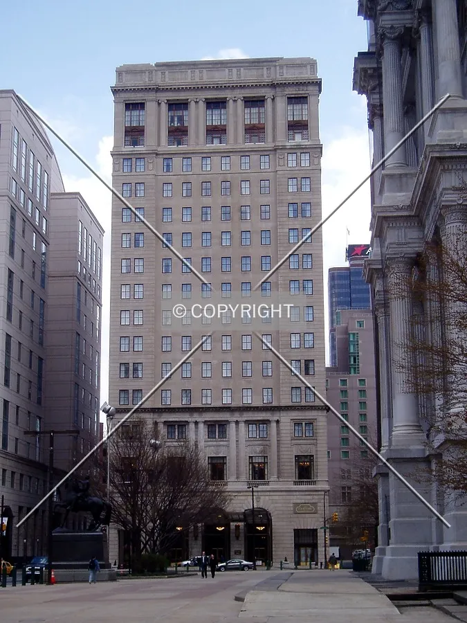 From the west across Penn Square, with the north side of City Hall on the right