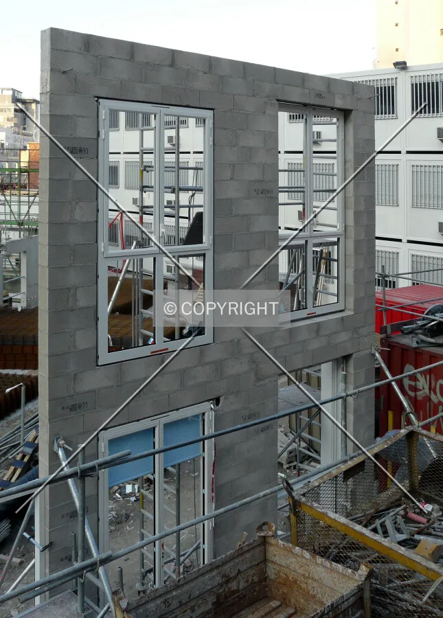 Cinder block wall for windows test, along Rue Cantagrel