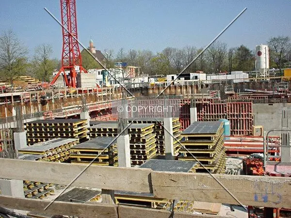 Construction material and scaffolding